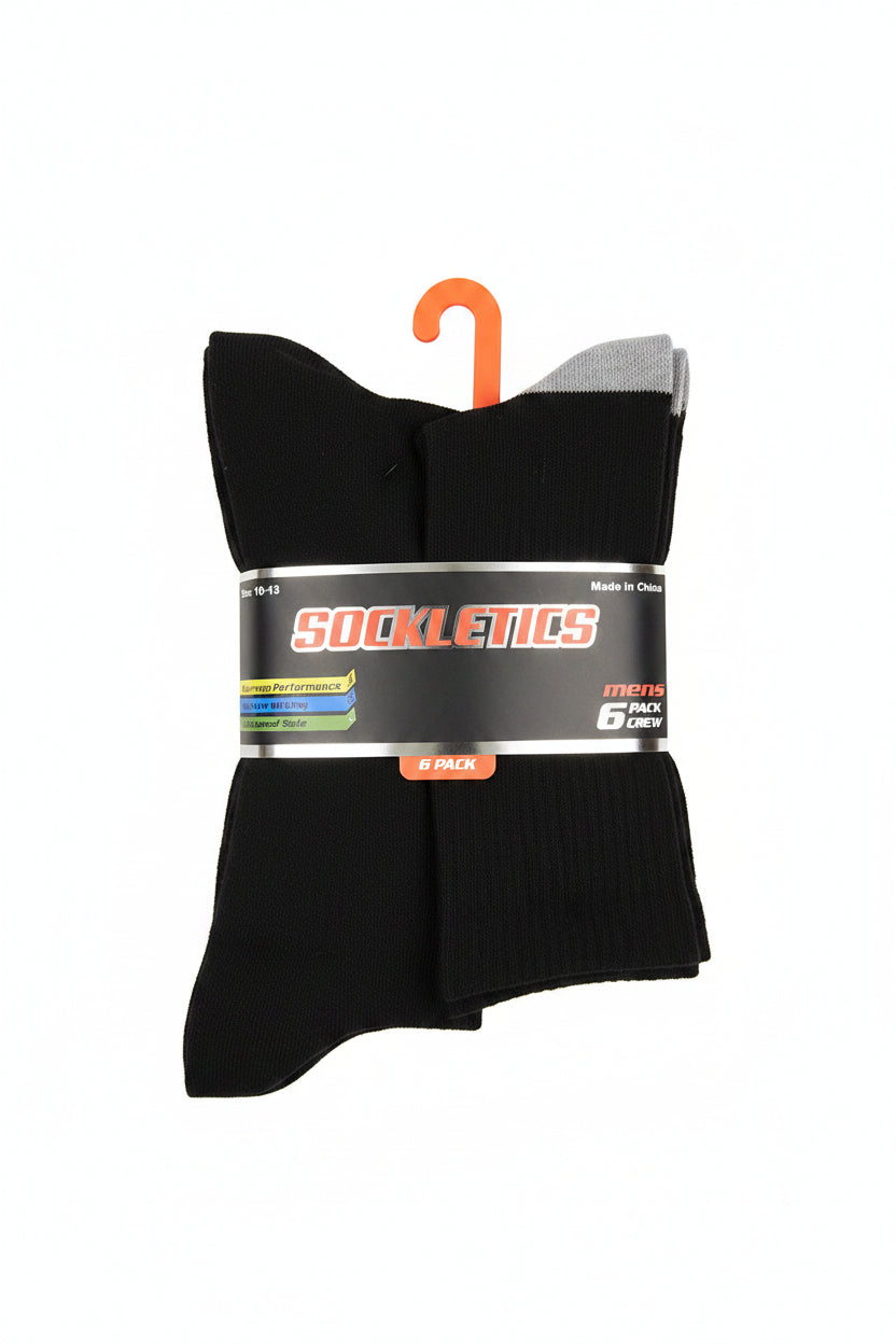 Pack of black socks with Sockletons branding on a gray concrete surface